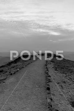 White and black sunrise over judean desert in Israel holy land Stock Photos