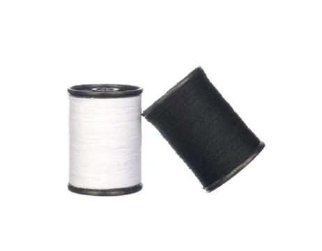 White and black thread isolated on white Stock Photos