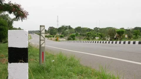 White and black traffic control sign Stock Footage 156990219