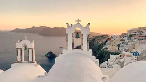 White and blue domed churches in village Oia in greek island Santorini in Greece Stock Footage 148958933