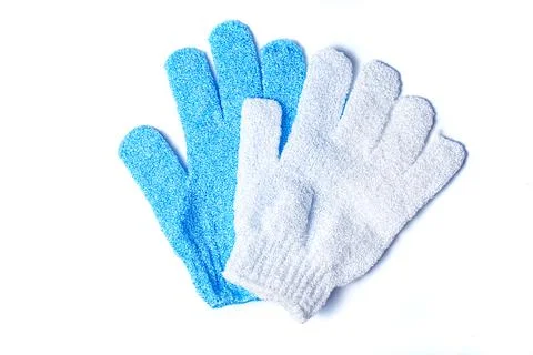 White and blue microfiber sponge-peeling glove. Isolate. Stock Photos