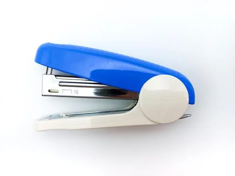 White And Blue Plastic StaplerIsolated On White Background. View From Above Stock Photos