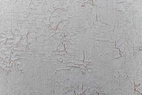 A white and brown fabric with a pattern of lines and dots Stock Photos