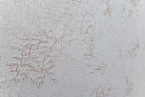 A white and brown fabric with a pattern of lines and dots Stock Photos