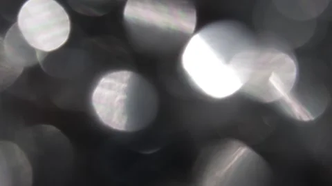 White and colored bokeh light leak video for transition effects and close-up ove Vídeos de archivo 317536384