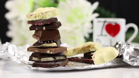 White and dark chocolate with different fillings Stock Footage 125013210