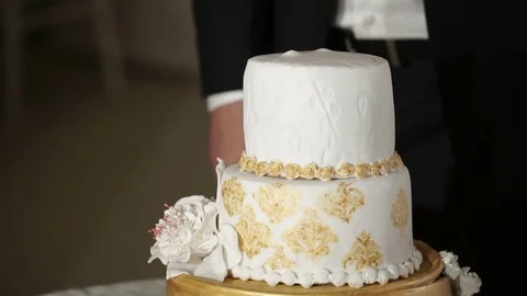 White and golden wedding cake Stock Footage