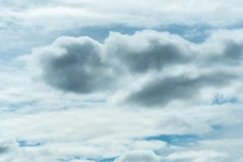 White and gray fluffy clouds on blue sky. Soft touch feeling like cotton. Whi Foto stock