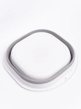 White and gray foldable silicone basin side view Stock Photos