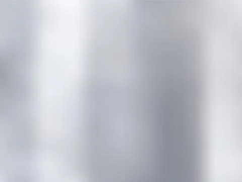 White and gray gradient blurred style background. Silver metal material textu Stockillustratie