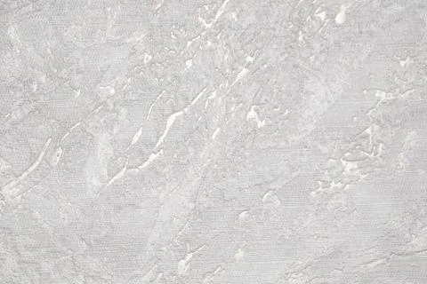 White and gray grooved texture. White rough surface. Stock Photos