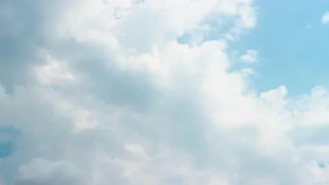 White and grey clouds on blue sky time lapse Stock Footage 131335859