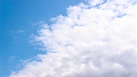 White and grey clouds on blue sky time lapse Stock Footage 131366852