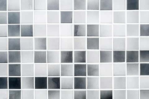White and grey small ceramic tiles on a bathroom wall Stock Illustration