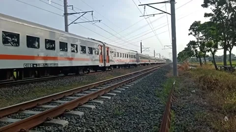 A White and Orange Train Stock Footage 215321705