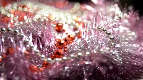 White and red beads on a shiny garland. Christmas mood and decoration  Stock Footage 228122273