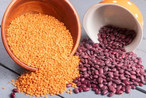 White and red beans with ginger lentils in bowls Stock Photos