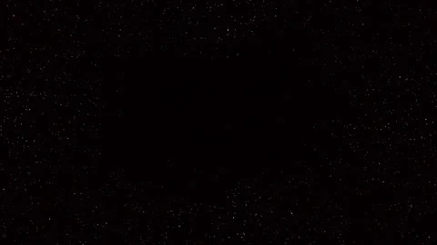 White and red dust particles glittering on black background with shimmer effect Video stock 339661805