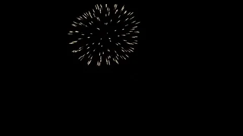 White and red fireworks explode in dark night sky Stock Footage 329673913