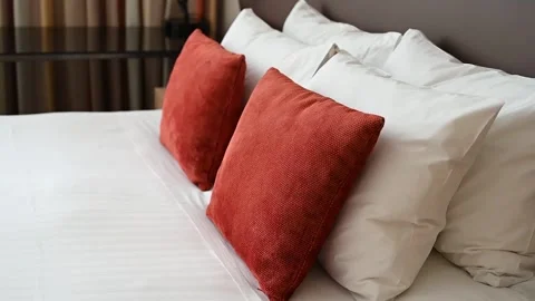 White and red pillows. Stock Footage 244486044
