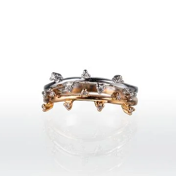 White and rose gold ring with diamonds Stock Photos