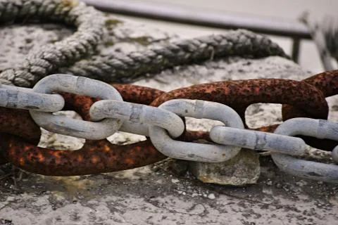 White and rusty chains Stock Photos