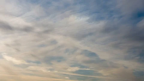 White and yellow clouds float across the sky, Cirrus clouds, Fast-forward, Stock Footage 120302301