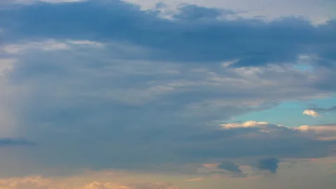 White and yellow clouds moving in time-lapse. Idyllic cloudy heaven background Stock Footage 134941281