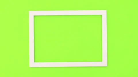 White and yellow frames appear on left side of green theme. Stop motion Stock Footage 138181585