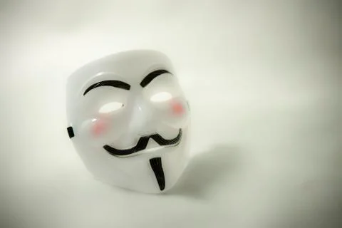 White anonymous mask on white background Stock Photos