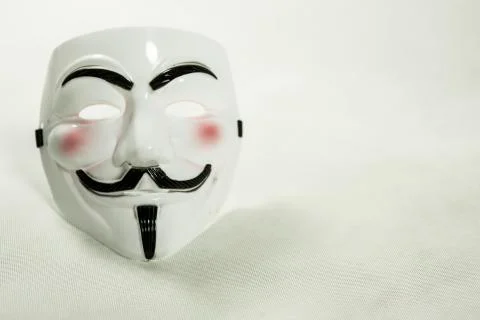 White anonymous mask on white background Stock Photos