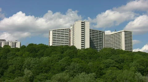 White apartments with green trees. Light timelapse. Stock Footage