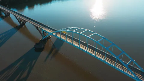 White Arch Bridge Casting Long Shadows Across Ozark River Stock Footage 344285248