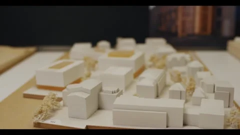 White Architectural Scale Model of Urban Building Complex, Studio Table Close Up Stock Footage 340299400