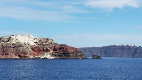 White architecture on the cliffs in Santorini island, Greece. Stock Footage 300773178