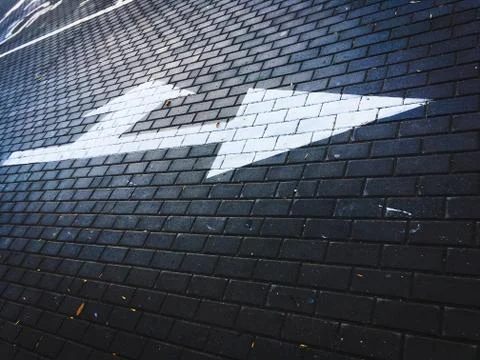 White arrow right on the road Stock Photos