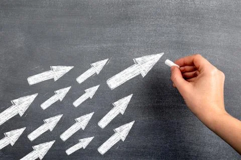 White arrows indicate the direction of tracking. Follow, leader, social media Stock Photos