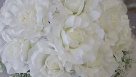 White artificial flowers on the wedding table Stock Footage 80080793