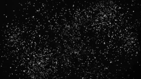 White artificial snow on black background. Wide Stock Photos