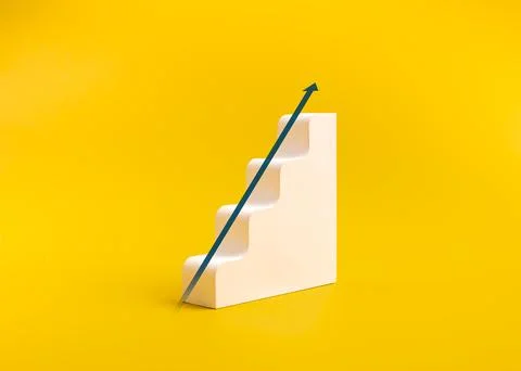 White ascending steps with upward arrow on bright yellow background symboli.. 스톡 사진