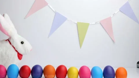 White baby rabbit toy with easter colorful eggs Stock-Footage 148861918