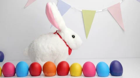 White baby rabbit toy with easter colorful eggs Stock-Footage 148862104
