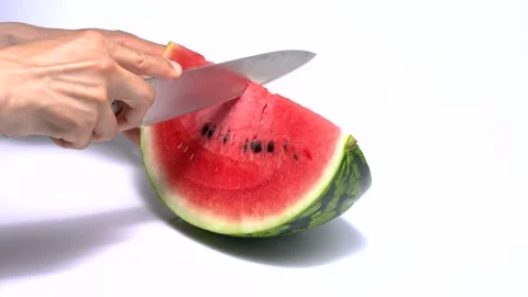 White background 4K slow motion video of cutting watermelon. Stock Footage 270692227