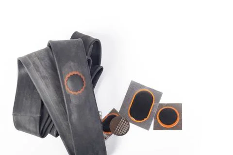 On white background. The camera from the bicycle on it is a patch of raw rubb Stock Photos