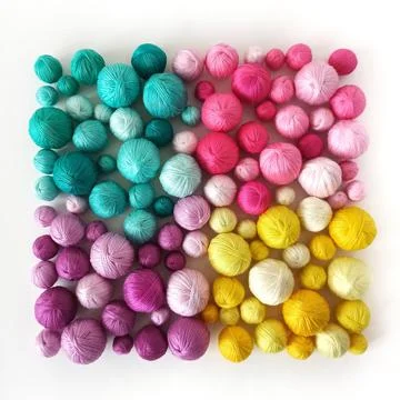 White background. Colored thread, balls of yarn. 库存照片