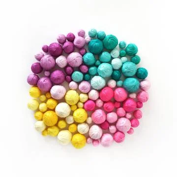 White background. Colored thread, balls of yarn. Stock Photos