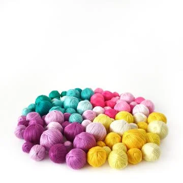 White background. Colored thread, balls of yarn. Stock Photos