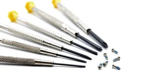 White background, copy spapce, precision screwdrivers with screws on white Stock Photos