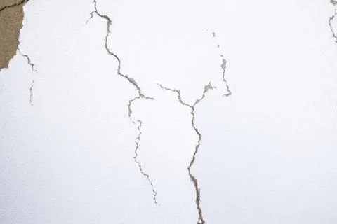 White background with cracks. Torn cracks on the texture. Textured space fo.. Stock Photos