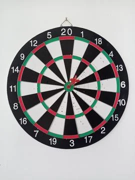 White background with dartboard. Stock Photos